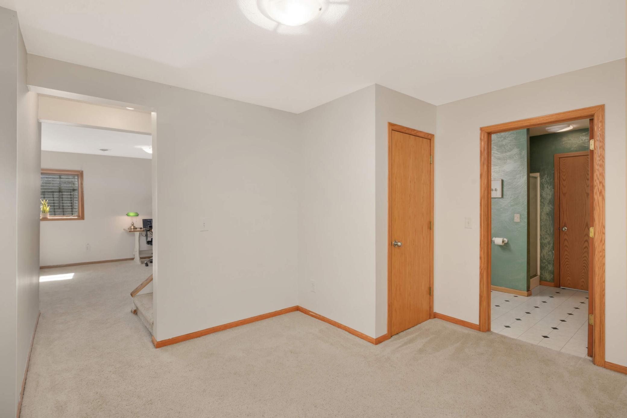 Exercise room leads to 3/4 bathroom!