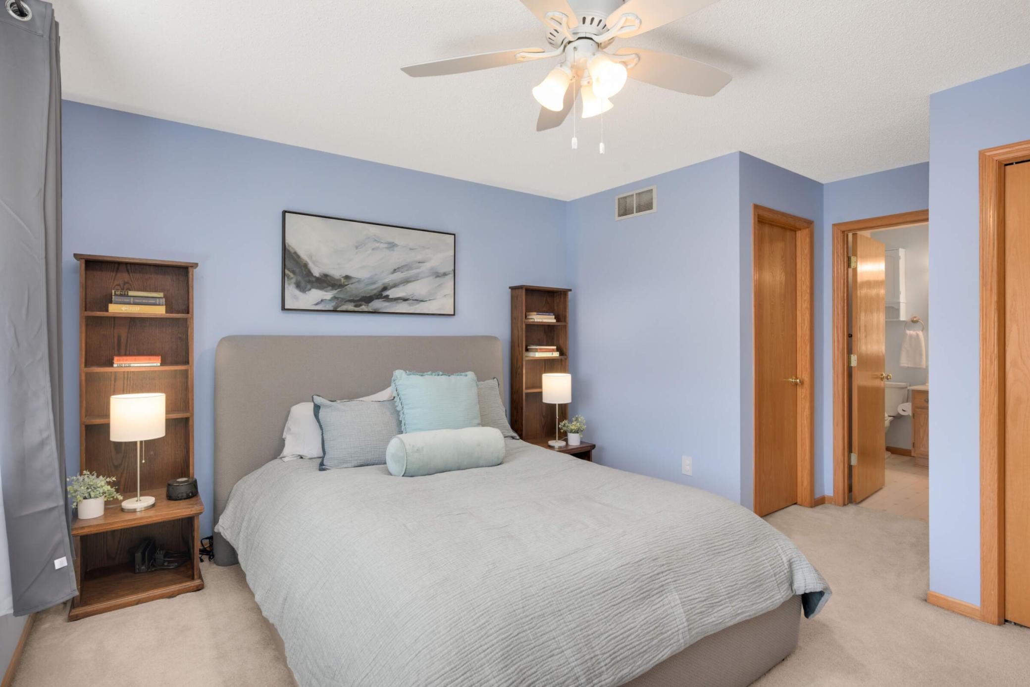 Soothing, peaceful colors in this Owner's Suite--leads to walk-in closet and full-size bathroom.