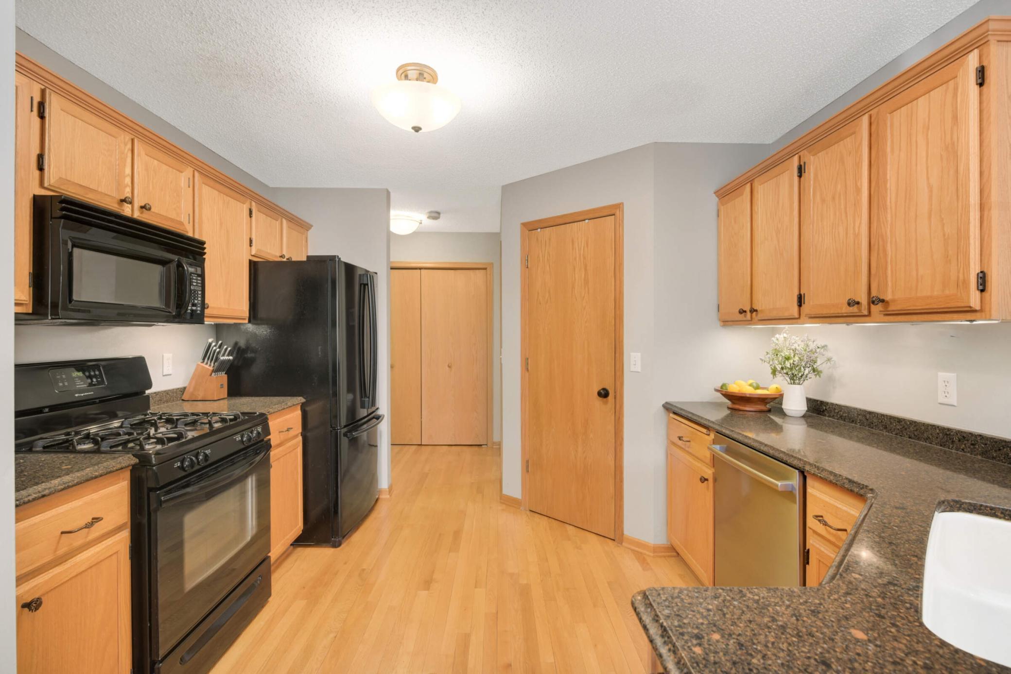 Another view of this great kitchen with so many cabinets!