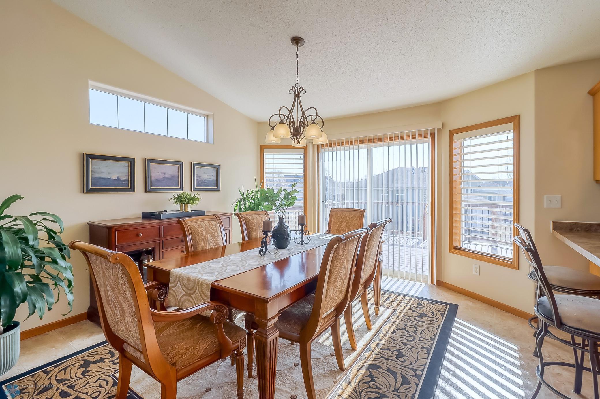 Sliding glass doors lead to the deck