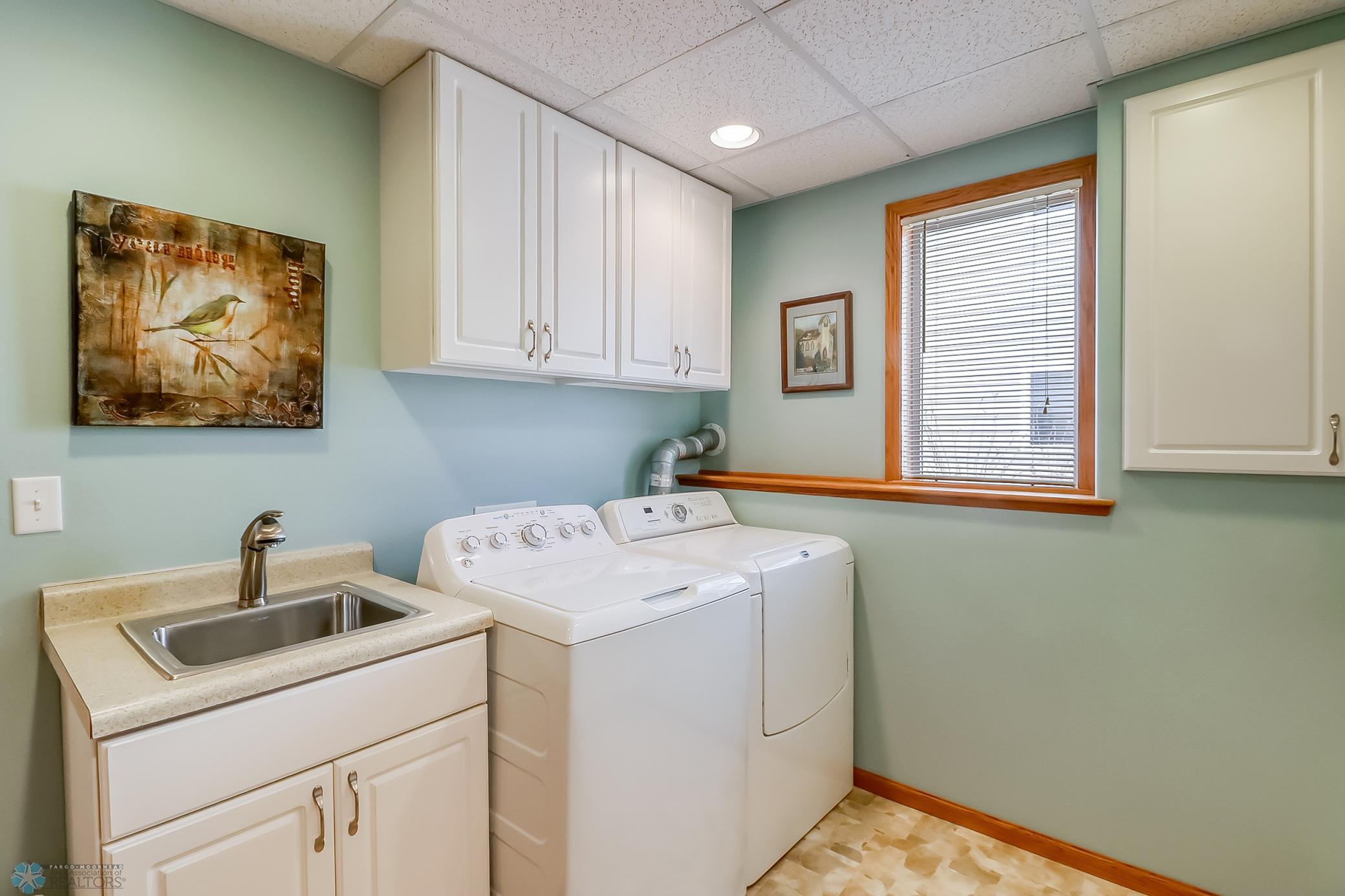 Convenient sink, washer and dryer included