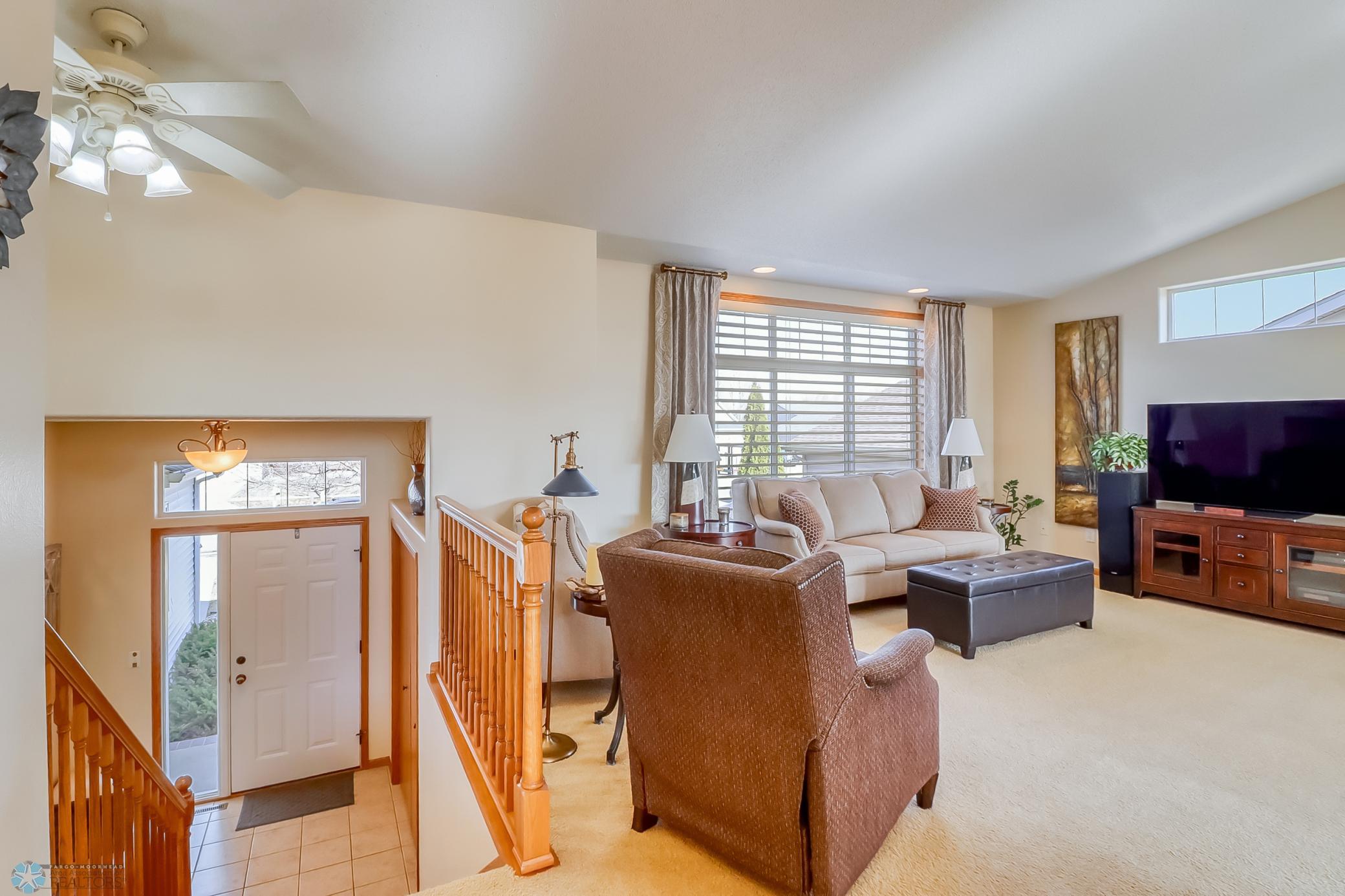 Upper level living room, large front window