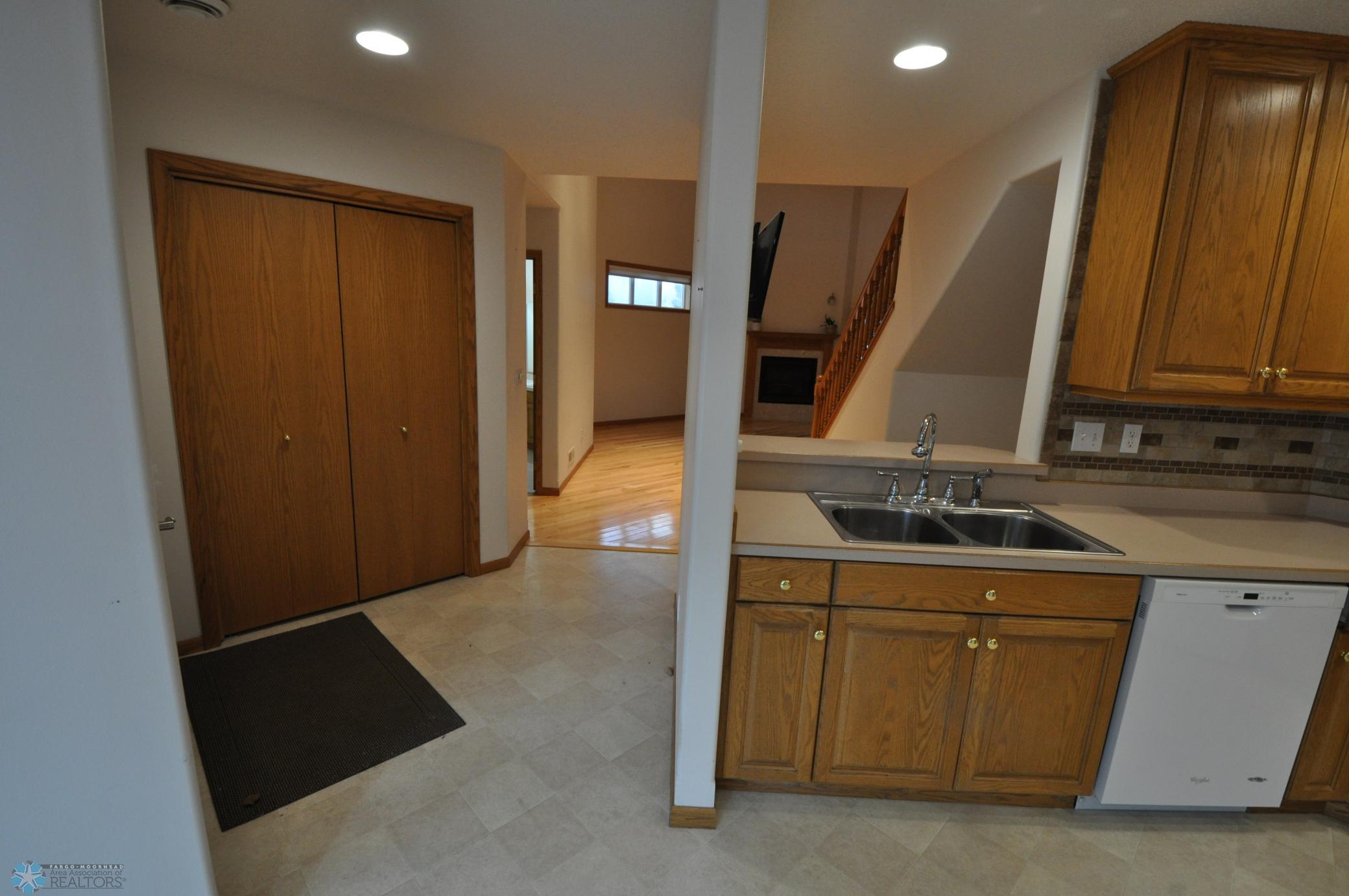 Kitchen looking to foyer