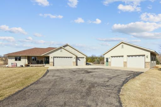 Gorgeous rambler...check! Large acreage lot...check! Detached heated and insulated 4 car garage....check! This property has it all!