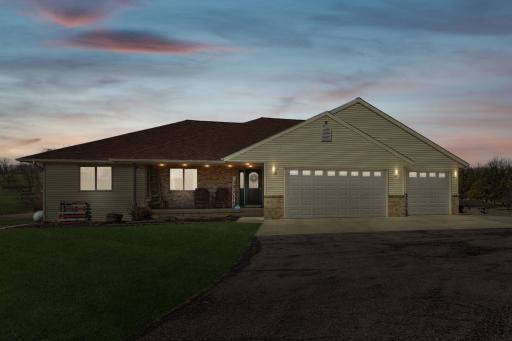 Gorgeous twilight view of this incredible home! Wouldn't you love coming home here?!