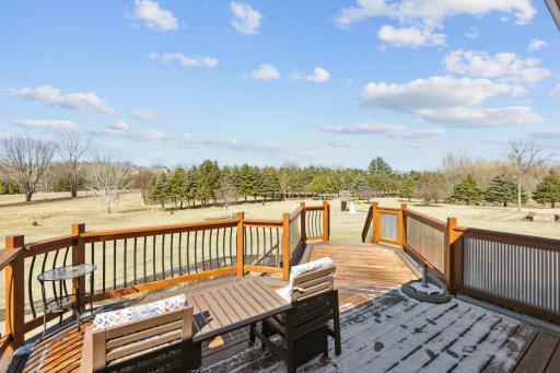 Relax on the large deck after a long day. Nice privacy on this 3.61 acre lot