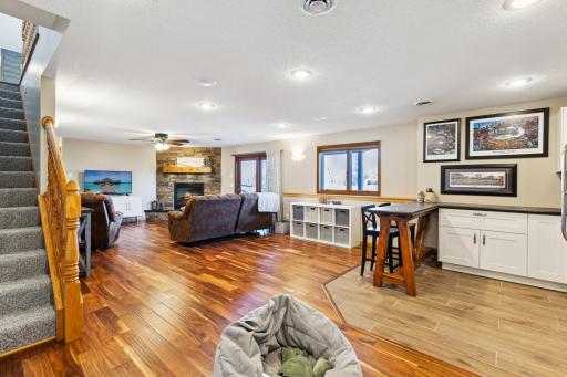 Another view of the lower level family room. This would be the perfect spot to enjoy the company of good friend or family. The bar area is well appointed! Card party, movie night? The possibilities are endless!