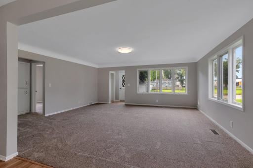 Large 18.5 x18.5 ft living room and entryway.