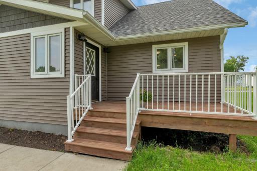 Deck right off of kitchen for convenient grilling.