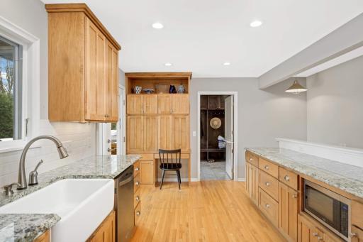 Recessed LED lighting, a door to the deck and open the the staircase