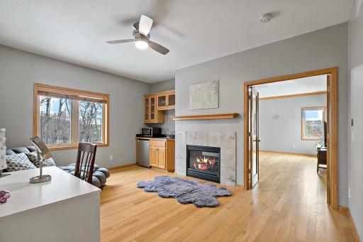 This owner's oasis!! wet-bar, sitting area, and double sided fireplace! Owners suite also includes a 5 piece master bath, and a huge walk-in closet!