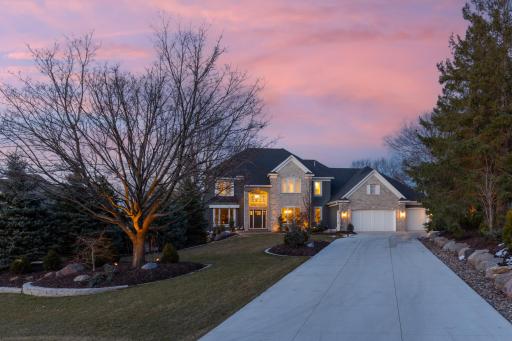 Perfectly nestled on a stunning and spacious 0.44-acre private lot, this exceptional Wooddale custom-built masterpiece radiates elegance and sophistication at every turn.