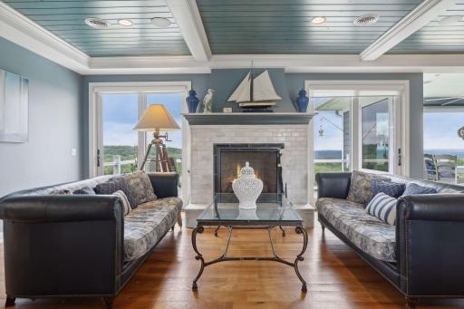 Beamed ceilings and gas fireplace for comfort