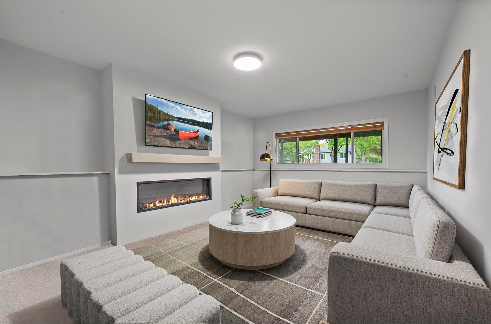 Virtually staged to show it as a family room.