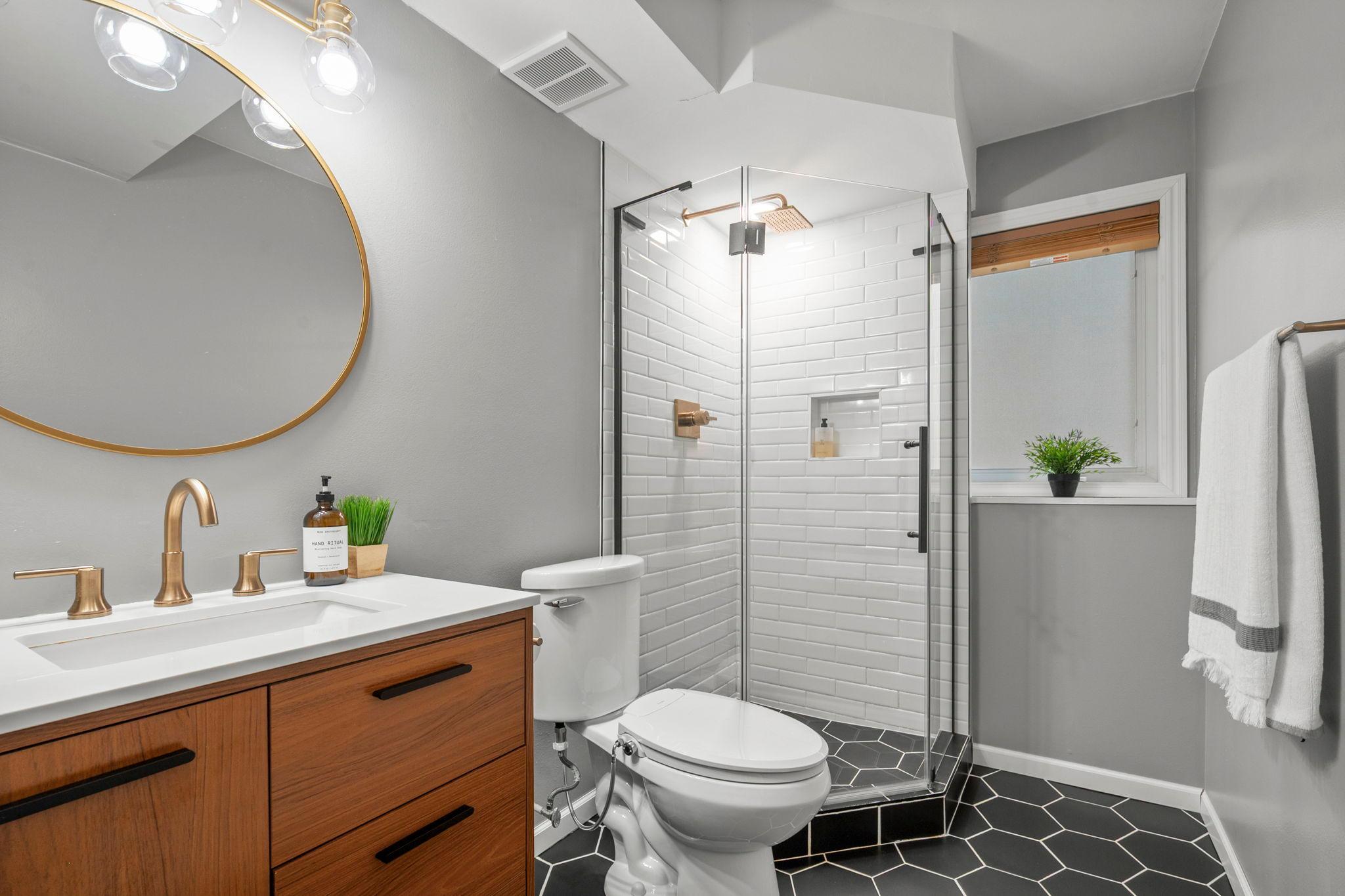 Beautifully remodeled lower level bathroom in 2020. Gorgeous pillow subway/tile, tiled floor, new vanity and sink.