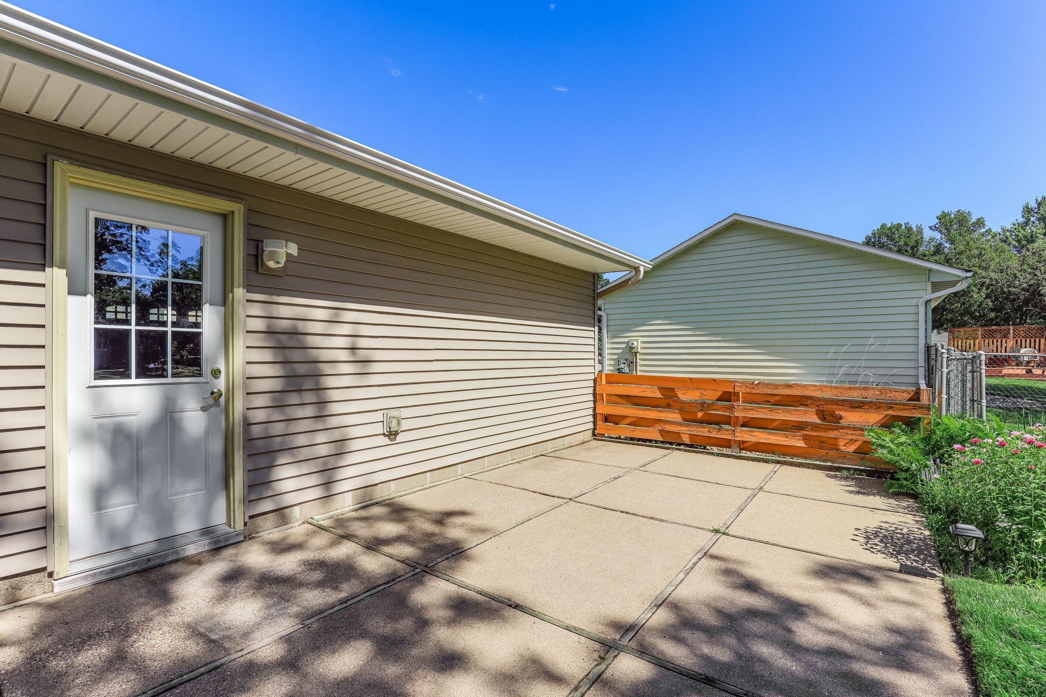 Huge patio off the back of the garage.