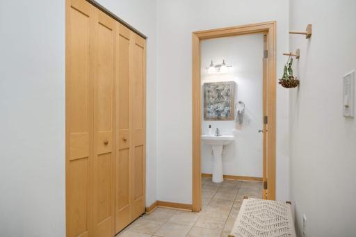 Main floor half bath set behind the kitchen.