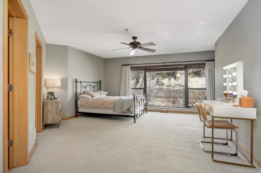 HUGE primary suite with it's own deck/balcony, walk-in closet and full bathroom!