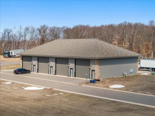Detached 2,040 sq ft garage/shop with oversized doors.