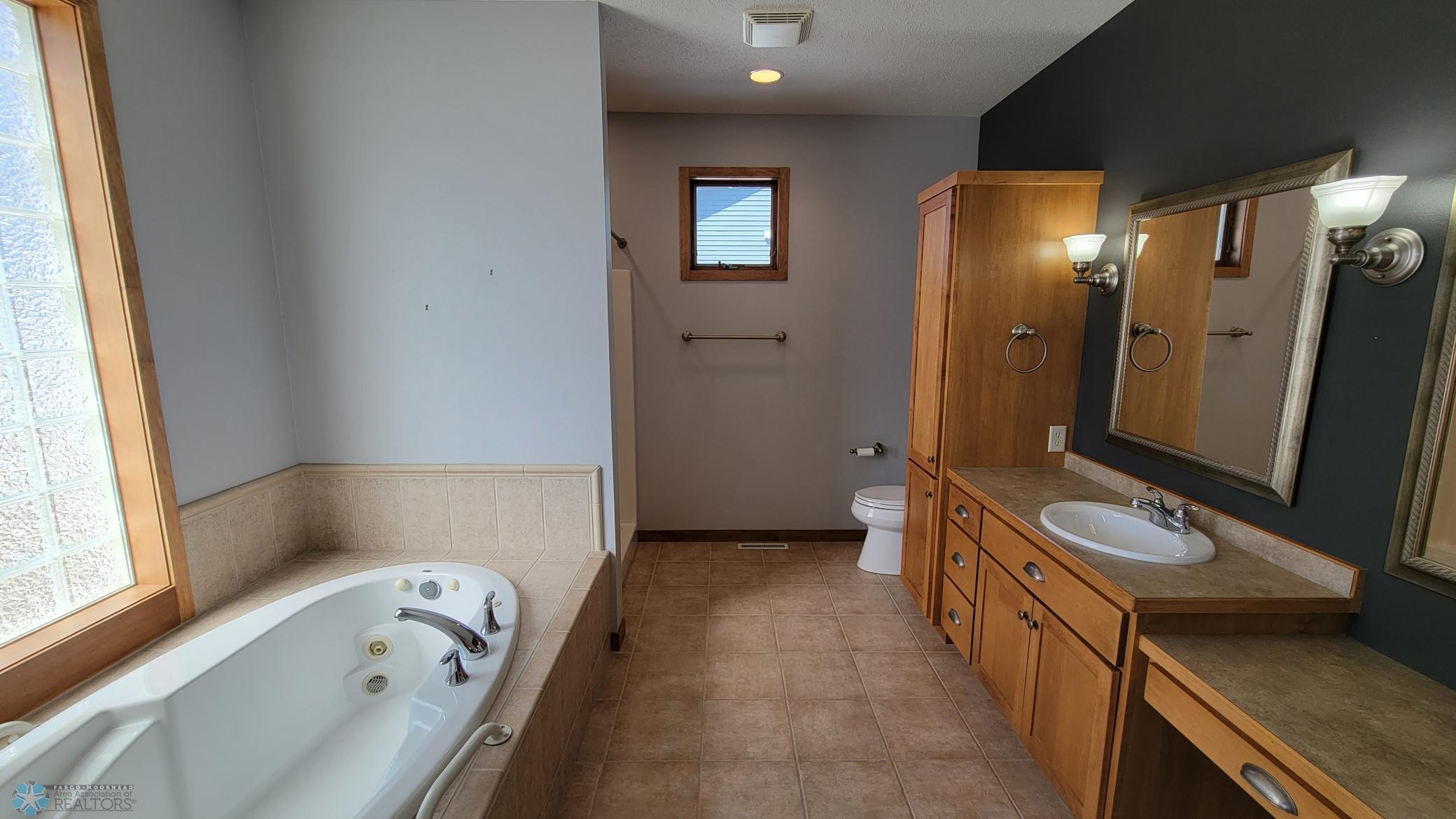 Primary bath with tub and shower