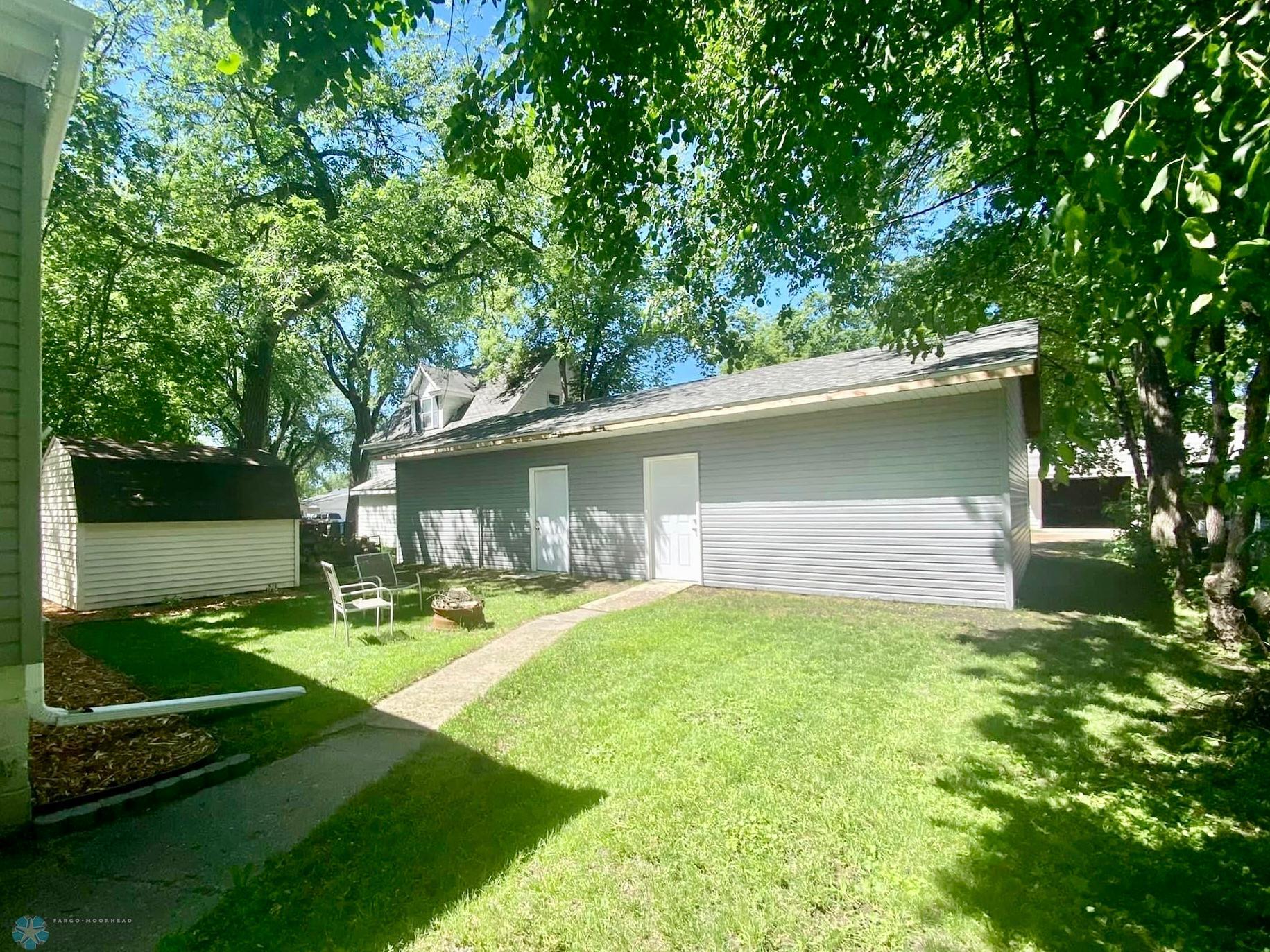 back yard to 4 stall garage