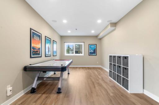 Back inside the additional basement space allows for pool table, air hockey or home gym.