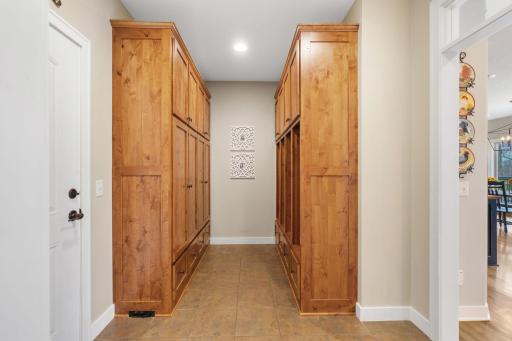 Custom build storage lockers create a tidy space for organizing coats, backpacks, sports gear and more.