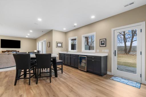 The addition of a wet bar provides a place for snacks for hosting family and friends. In floor heating throughout this level keep your feet warm in the winter months.