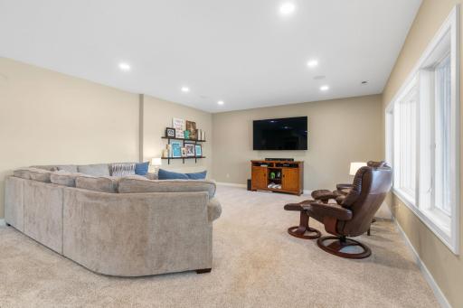 A gas line sits on the far wall for an option to add an additional fireplace and surround sound makes the perfect place for movie night.