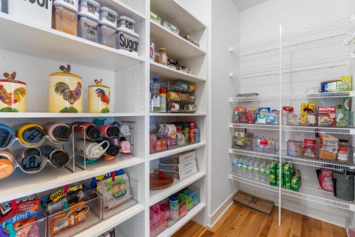 Located off the kitchen the oversized pantry provides space for snacks, appliances and backstock.