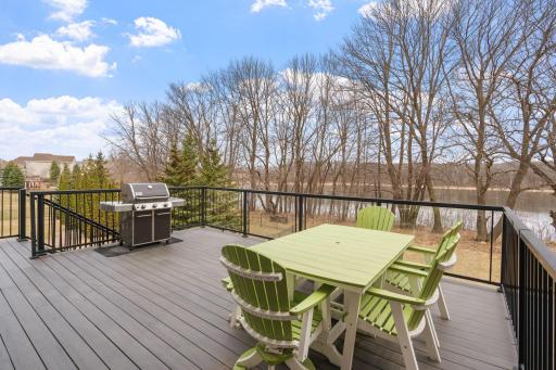 Recently refinished, the TimberTech deck offers space to enjoy the nice weather with an unimpeded view of the pond in the rear of the home.