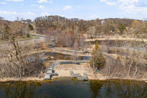 Above and beyond the beautiful home itself you also obtain deeded access to Spring Lake with a dock and boat lift transferred with sale.