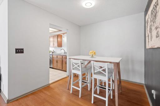 Spacious dining area off the kitchen & open to the living room.