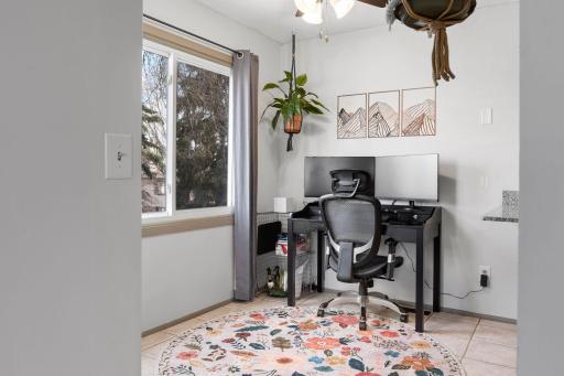 Multi-purpose space adjacent to the kitchen. Could be used as an in-home office or convert to an eat-in kitchen.