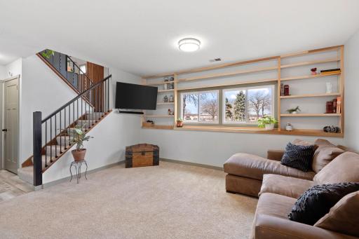 Lookout windows add natural light, brightening the lower level.