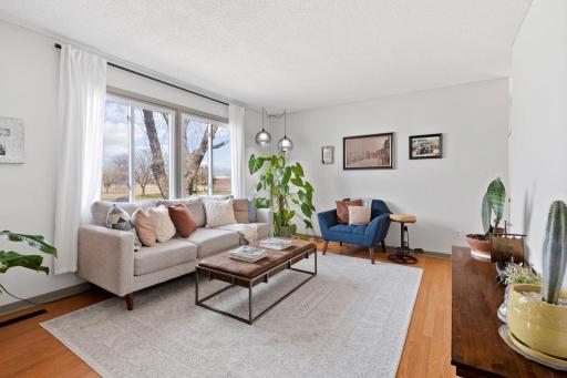 Large windows flood the main level with natural light.