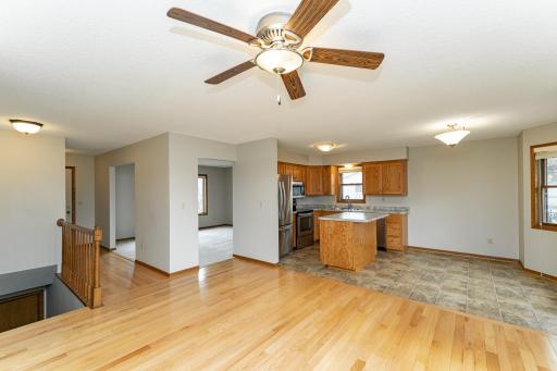 Family room with hardwood floors and deck access