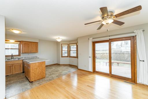 Family room with hardwood floors and deck access