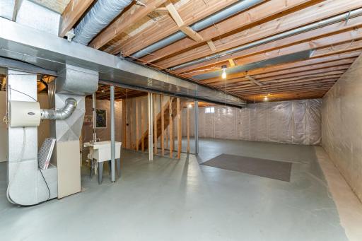 Unfinished basement - great storage, play or hobby space