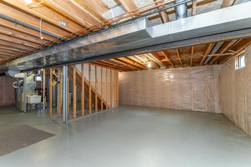 Unfinished basement - great storage, play or hobby space