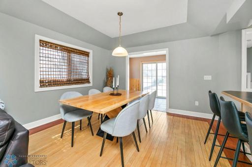 Dining area with chandelier & tray ceiling