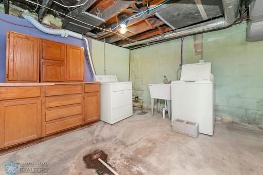 Basement laundry with utility sink. Laundry hookups available on main floor also.