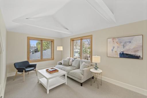 Vaulted upper family room with beams and LAKE VIEWS