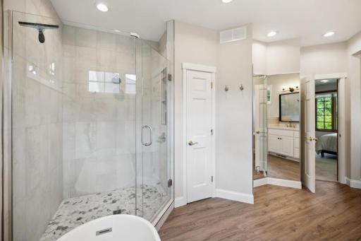 The spa-inspired ensuite bath is a calming extension of the primary suite.
