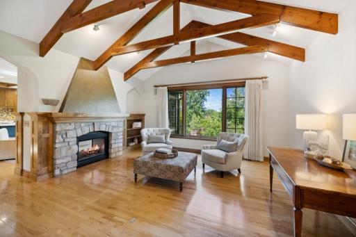 Floor-to-ceiling windows frame sweeping views of Prestwick’s 4th fairway, inviting natural light to fill the space throughout the day.