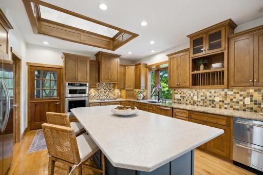 The spacious island offers an ideal stage for artfully arranged desserts, hors d’oeuvres, and charcuterie boards.
