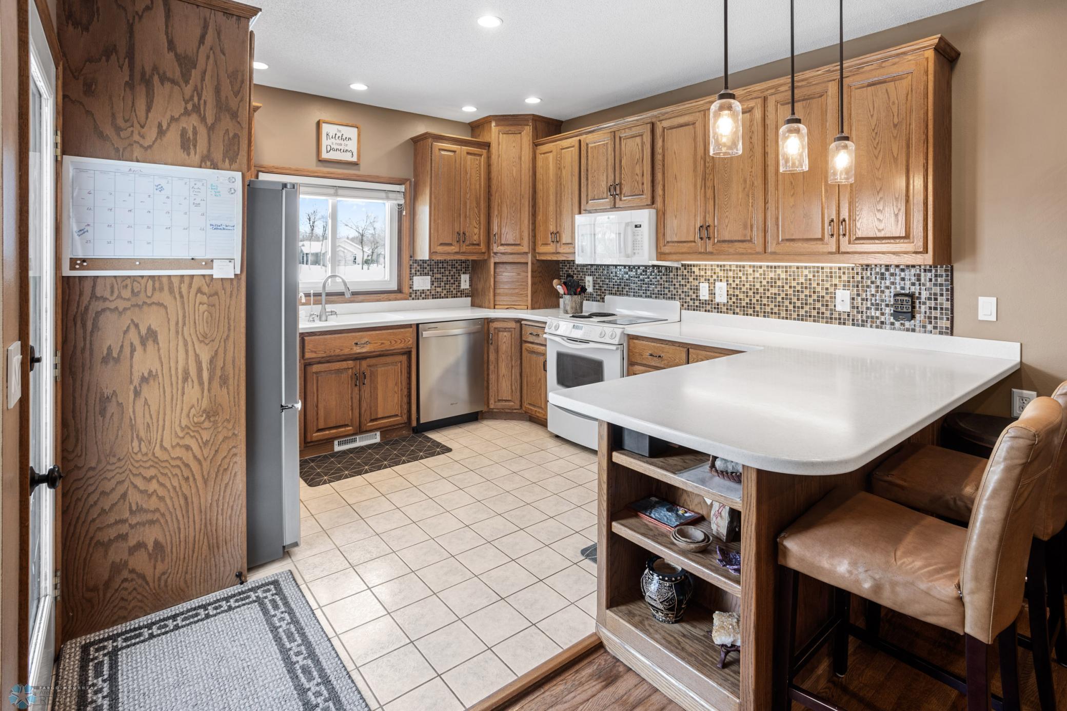 Custom Kitchen, Tile Floors and Breakfast Nook