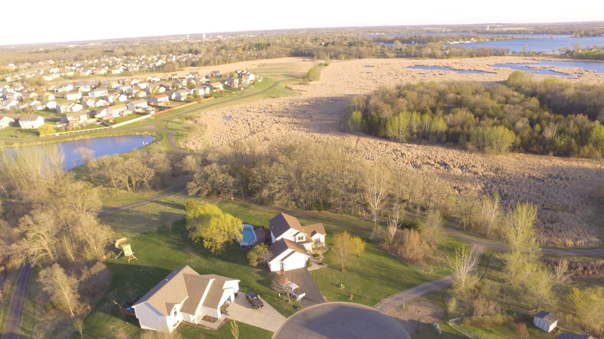 Cul-de-sac & trail view (home on left, pre-siding replacement).