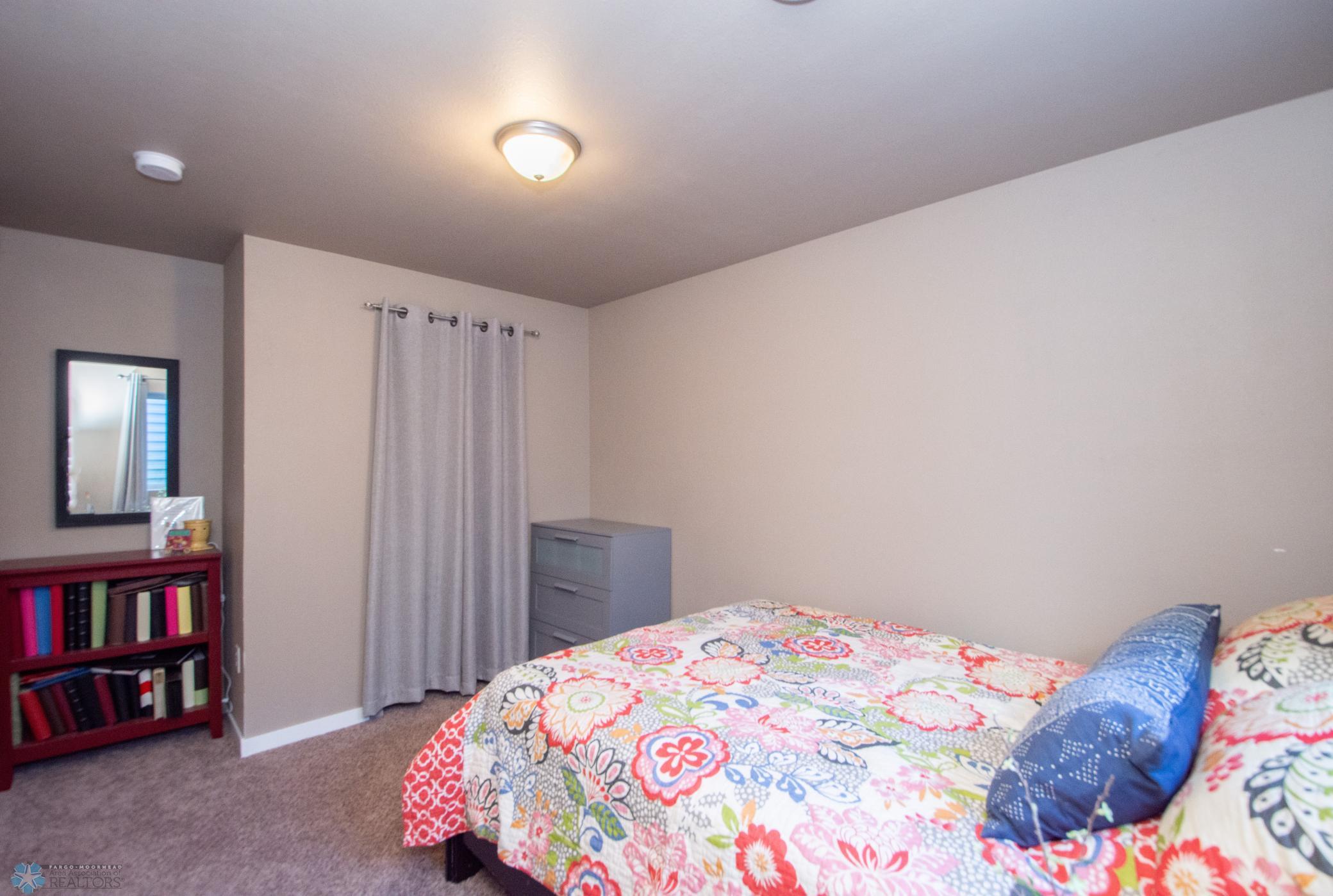 basement bedroom w/ walk in closet