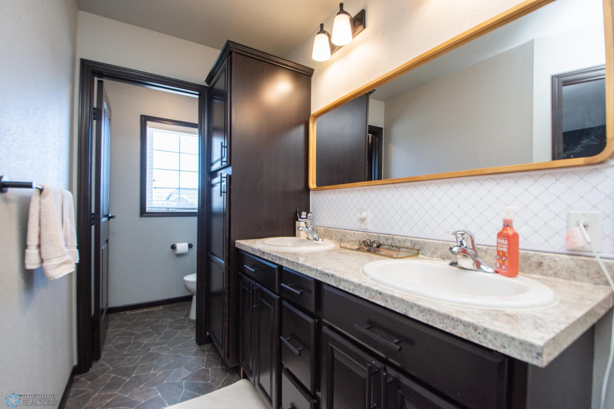 primary bathroom with extra storage